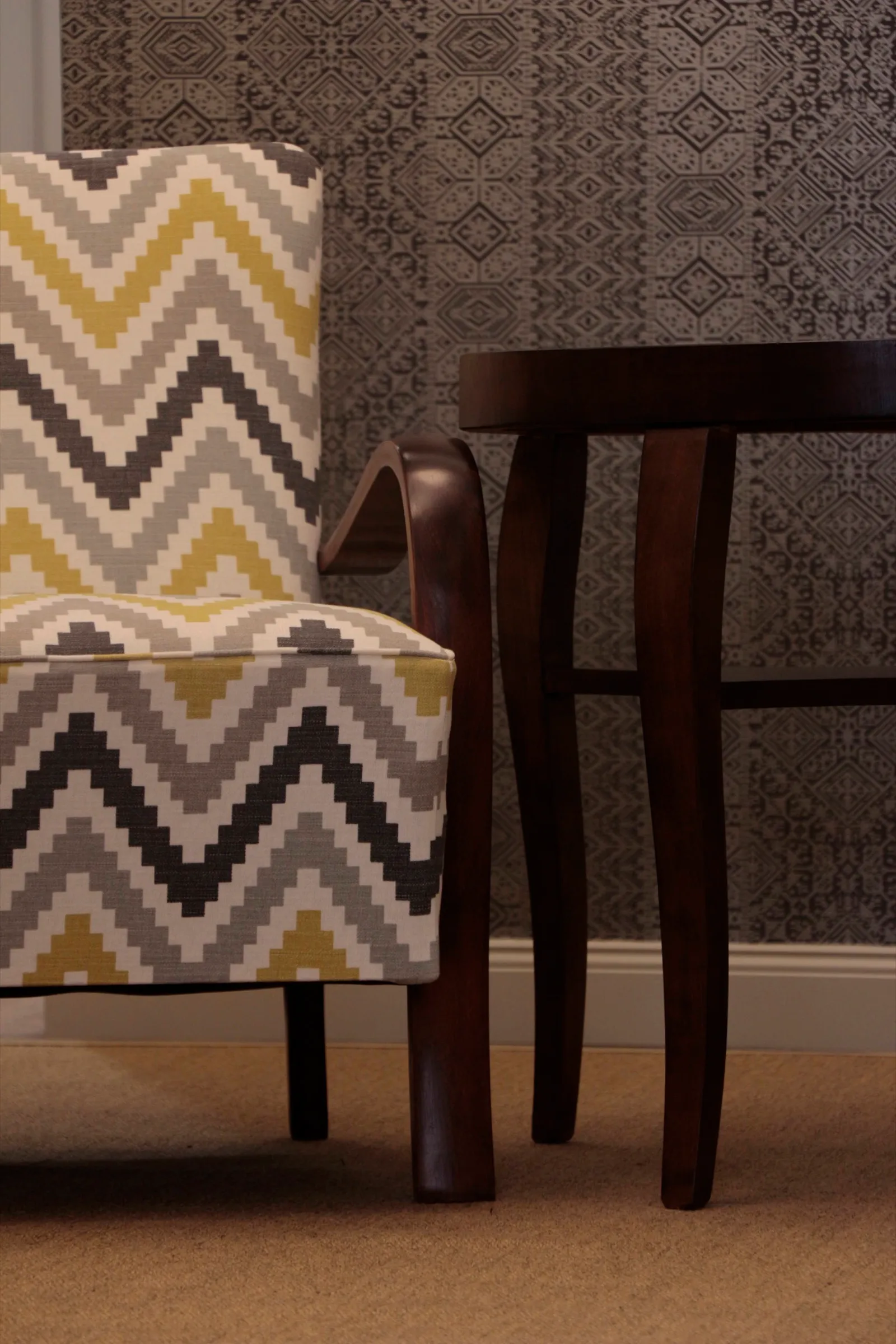 Detail of an armchair and table in the waiting room